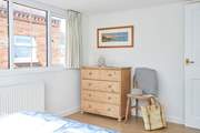Natural light and a touch of coastal inspiration in this bedroom.