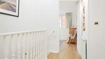 The first-floor landing is bathed in natural light.