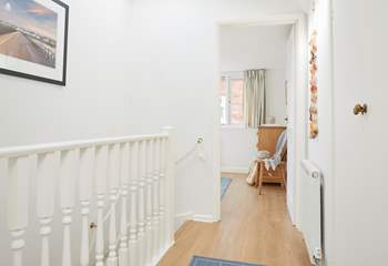 The first-floor landing is bathed in natural light.