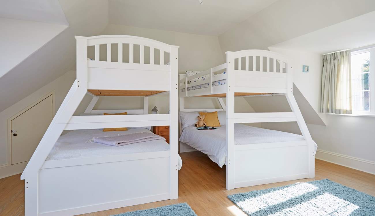 The family bedroom on the first floor offering flexible sleeping quarters that would suit adults and children alike...