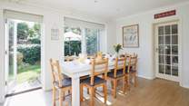 A lovely gathering spot for family meals, the dining-area seats up to eight people.