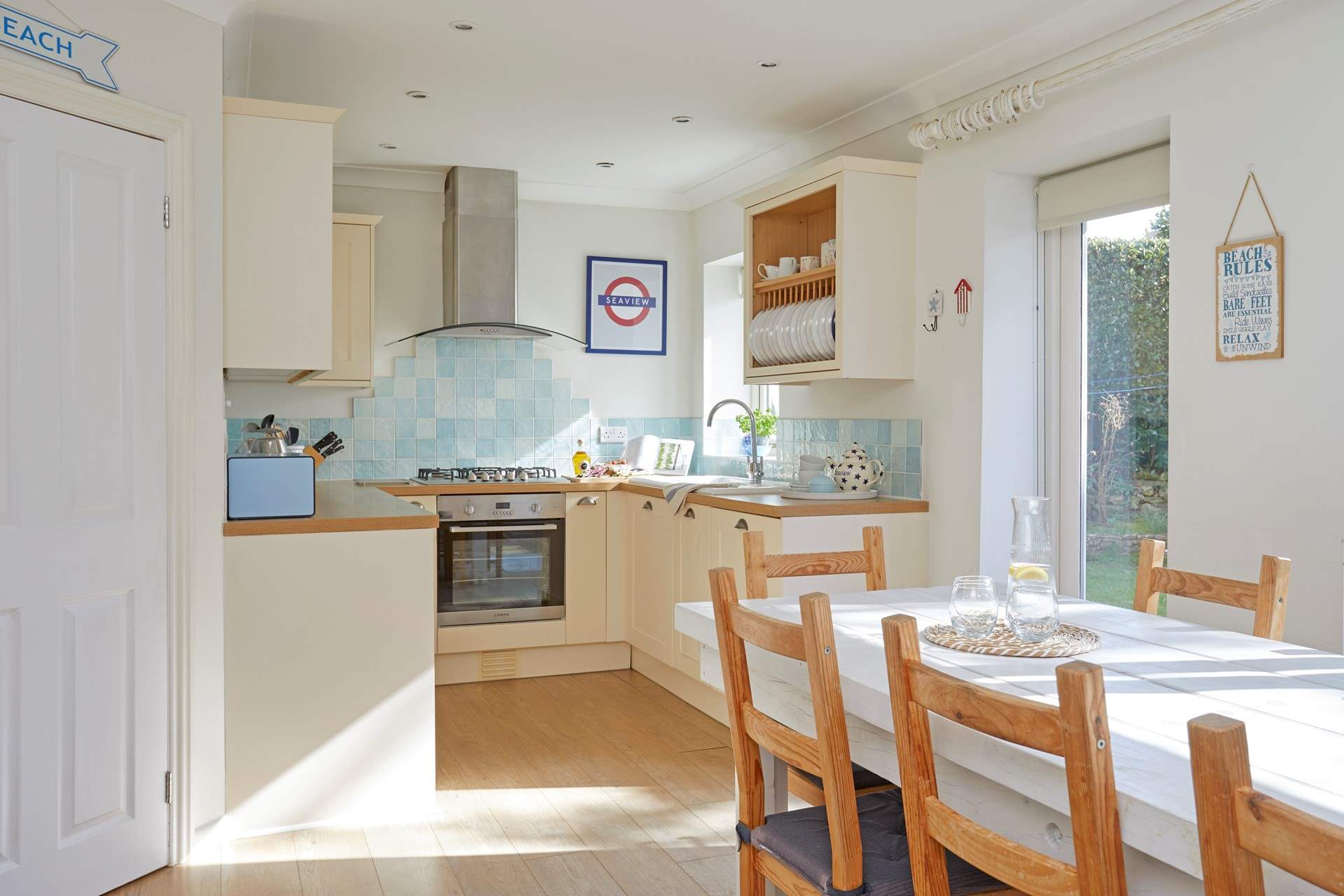 The kitchen/dining-room opens out to a lovely private enclosed garden.