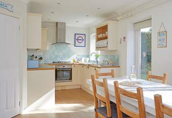 The kitchen/dining-room opens out to a lovely private enclosed garden.