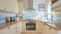 Cook up a treat in the well-equipped kitchen.