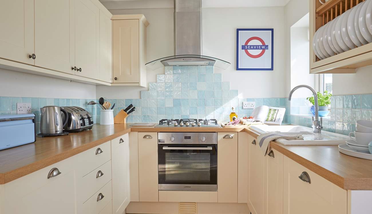 Cook up a treat in the well-equipped kitchen.