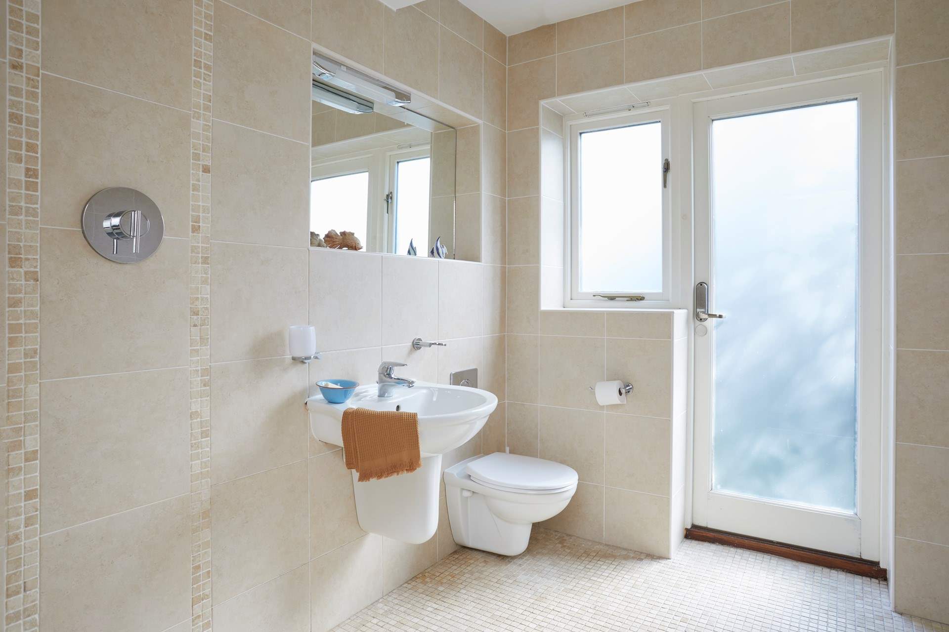 The spacious, modern wet-room on the ground floor is a real convenience. 
