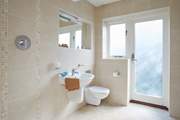 The spacious, modern wet-room on the ground floor is a real convenience.