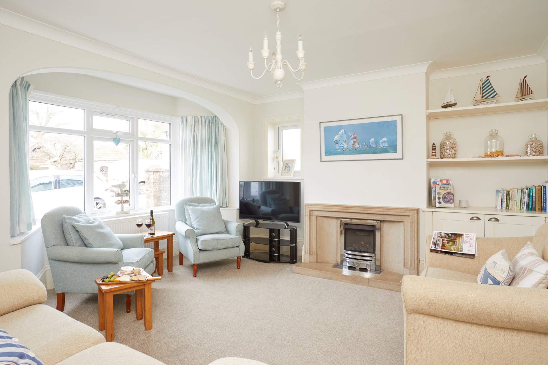 One of two pleasant sitting-rooms that offer ample space for the entire family.