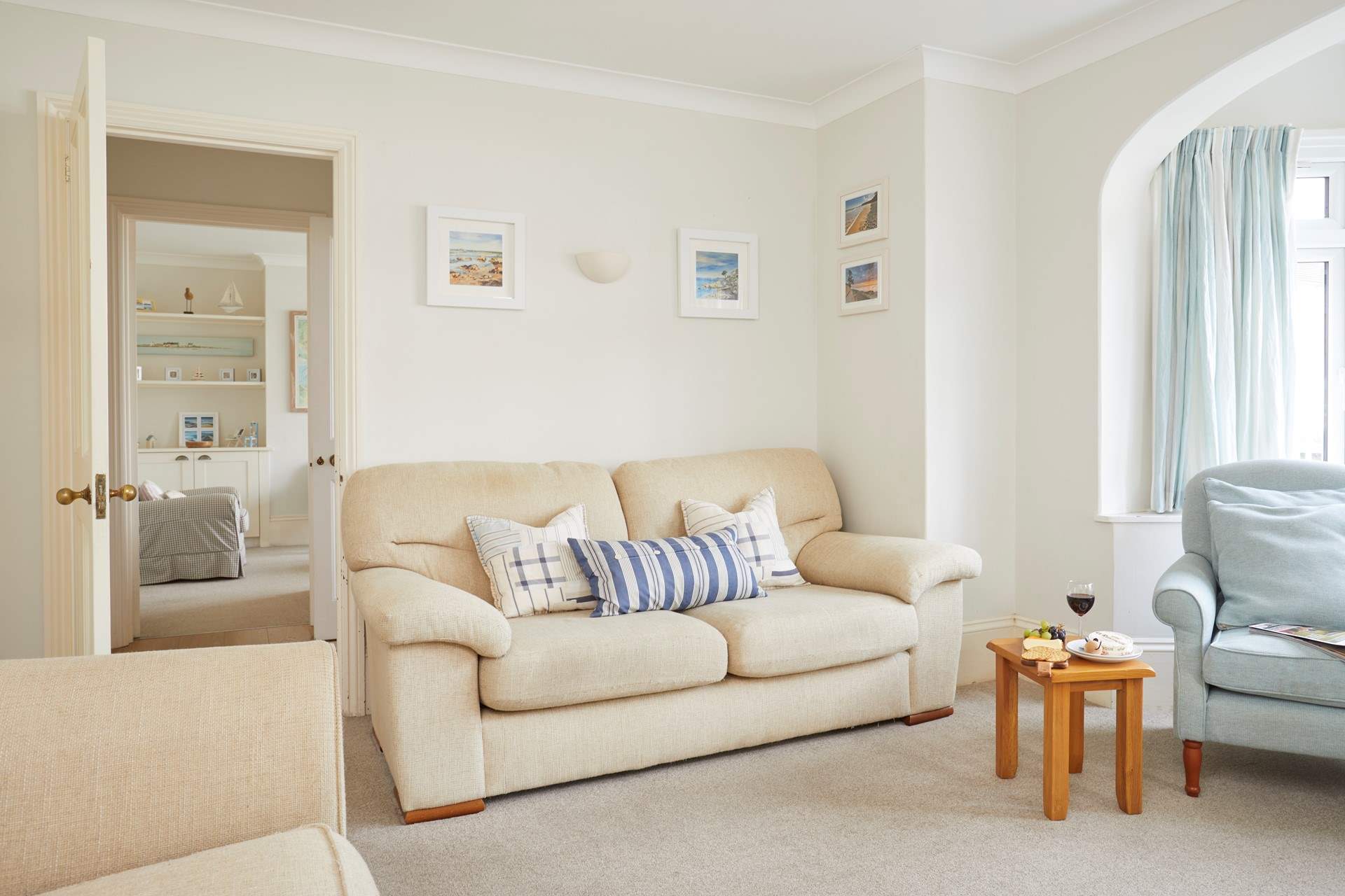 A peek from one stylish sitting room into the other...