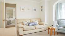 A peek from one stylish sitting room into the other...