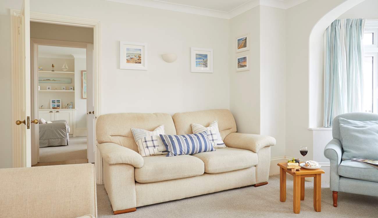 A peek from one stylish sitting room into the other...