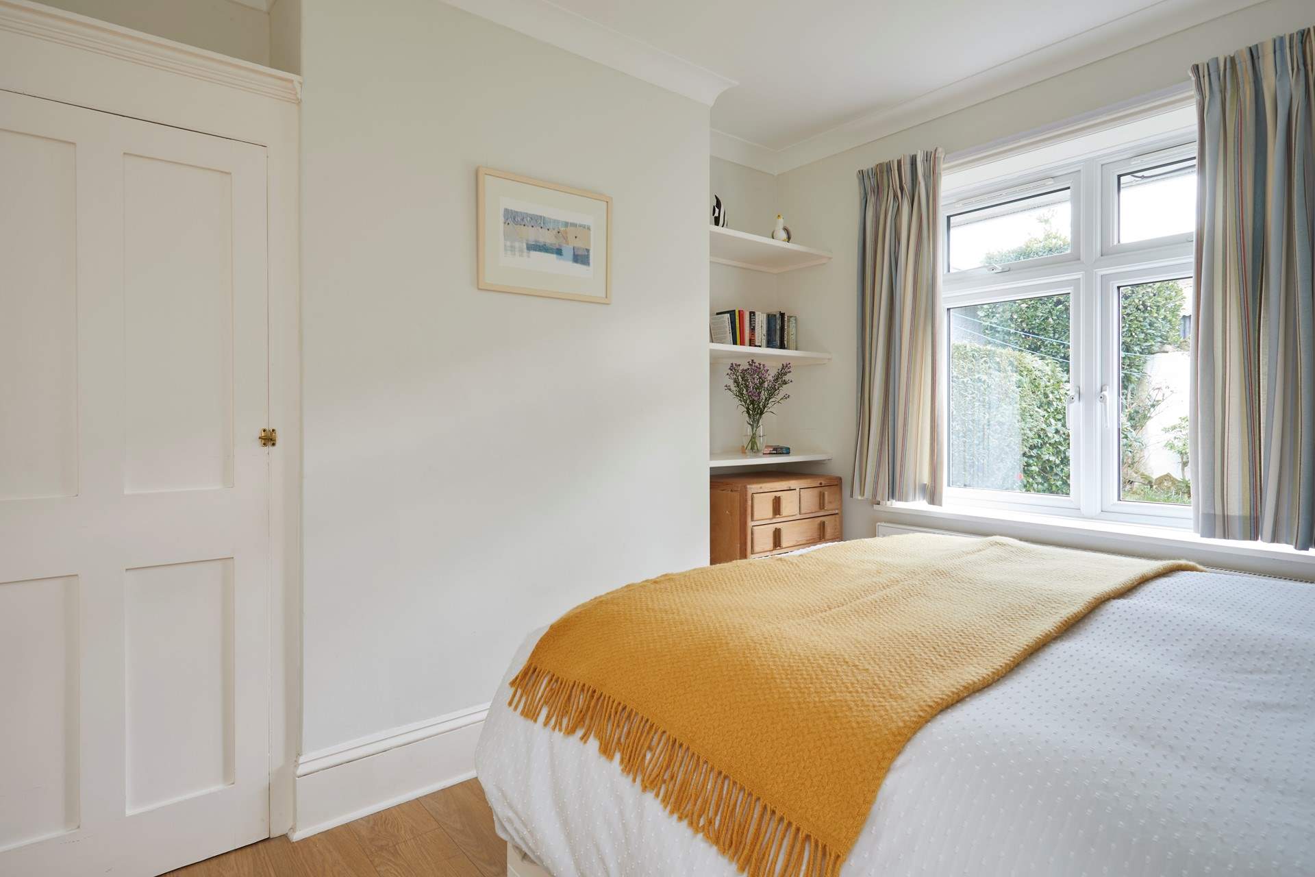 Complete with an en suite cloakroom, the ground floor bedroom is spacious and bright.