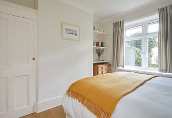 Complete with an en suite cloakroom, the ground floor bedroom is spacious and bright.