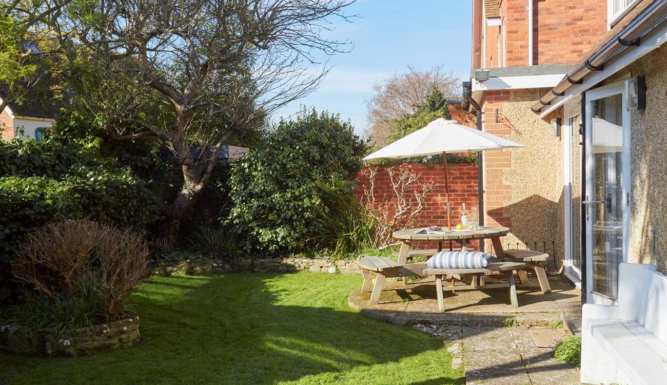 The leafy private garden is fully enclosed, ideal for active young children and pets.