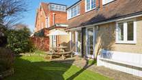 Picture yourself enjoying the sunshine in the pretty garden.