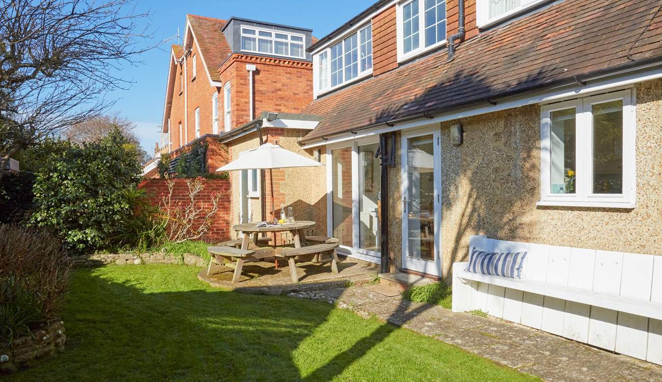 Picture yourself enjoying the sunshine in the pretty garden.