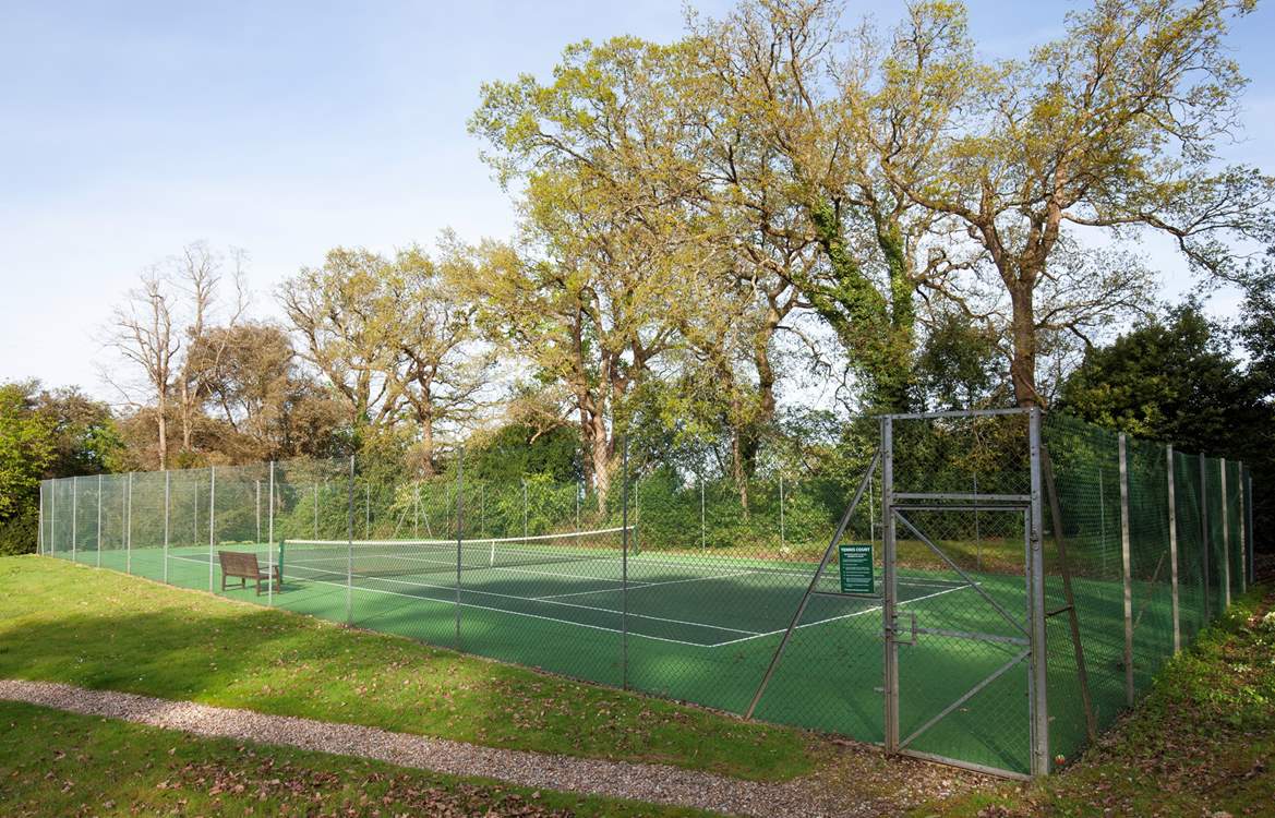 Enjoy a game of tennis in the grounds, but make sure you book your time slot.