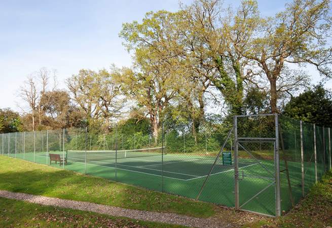 Enjoy a game of tennis in the grounds, but make sure you book your time slot.