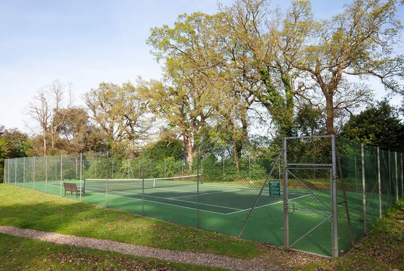 Enjoy a game of tennis in the grounds, but make sure you book your time slot.
