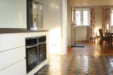 The whole dining experience is enhanced by the open plan kitchen/dining-room.