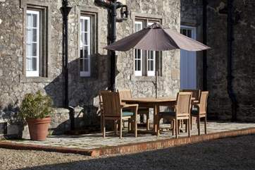 Enjoy a meal in the sheltered garden.
