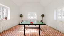 Enjoy a game of table tennis, one of many facilities available to guests at Barton Manor.