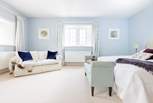This beautiful room is decorated in calm pastel blue shades.