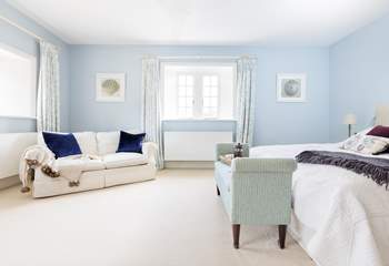 This beautiful room is decorated in calm pastel blue shades.