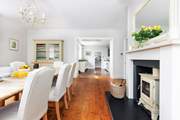 The dining room leads into the kitchen, perfect for sociable dining. 