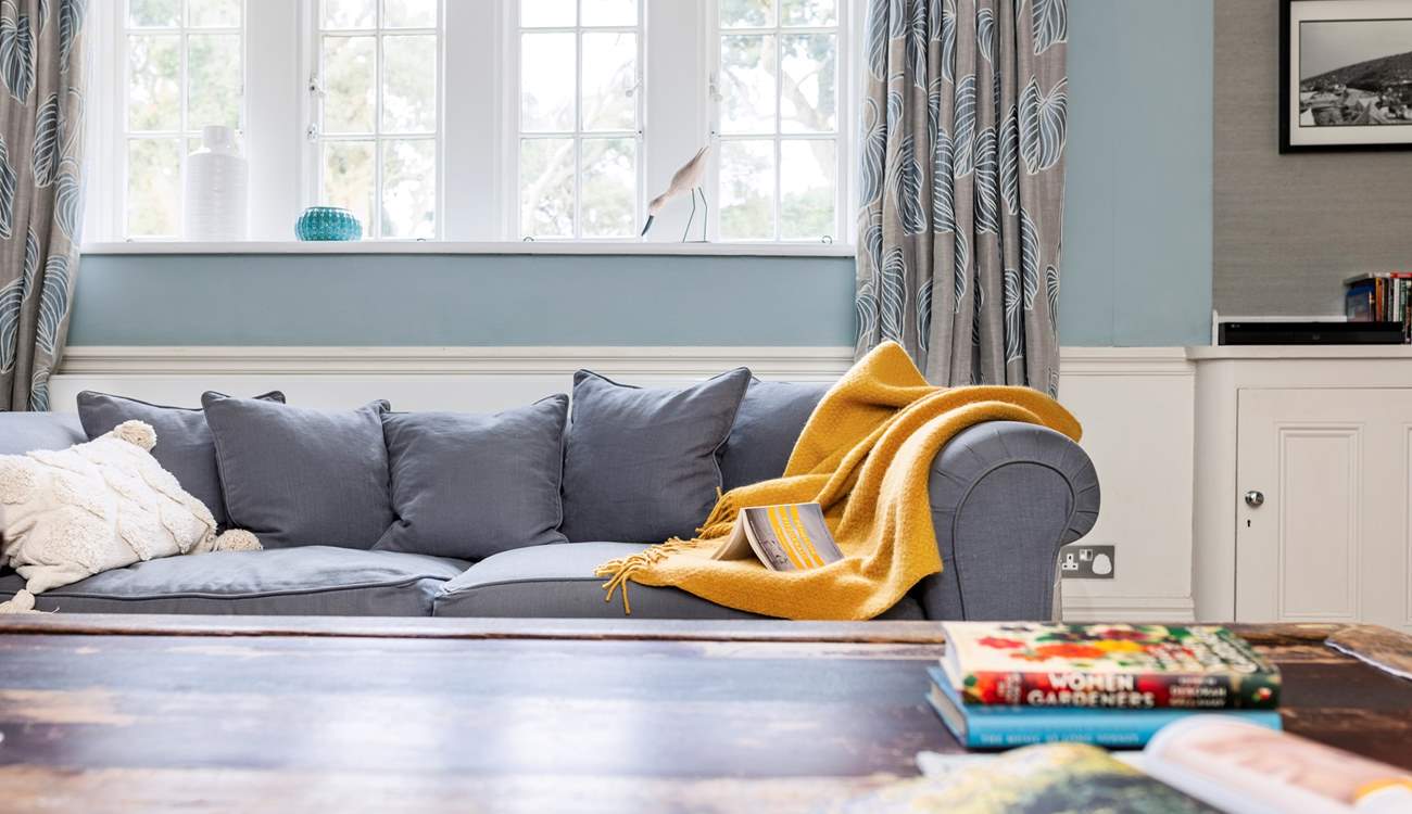 Relax on the sofa with a good holiday read. 