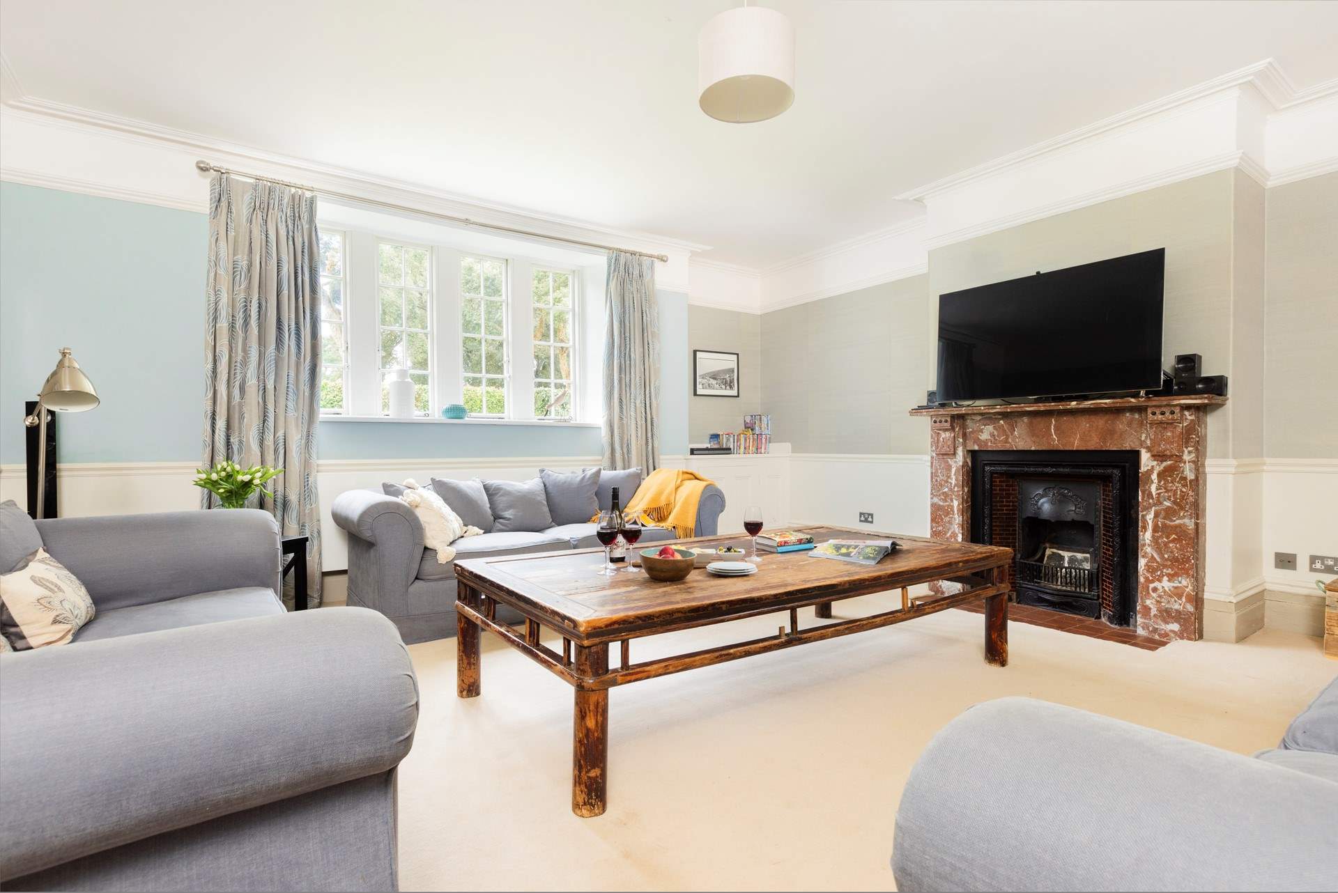 Cosy up in the living room, with TV, DVD player and wood burner. 