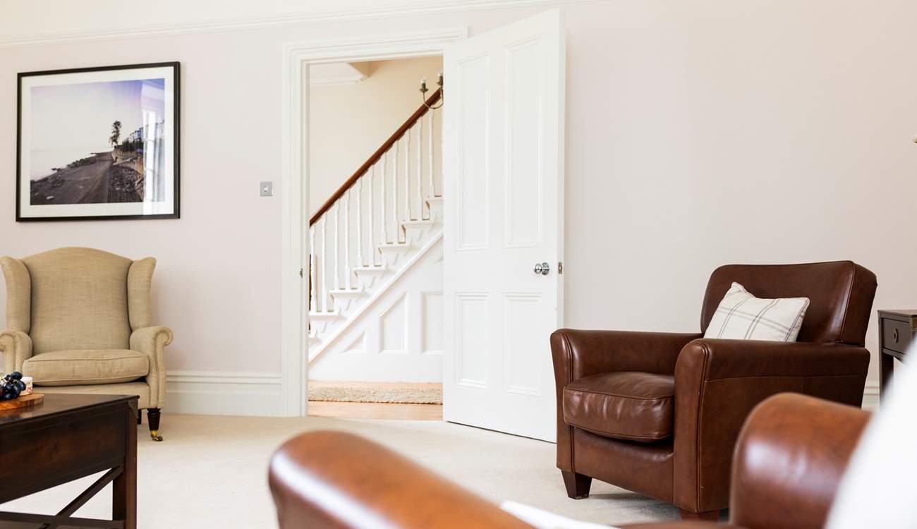 The sitting-room leads off the hallway. 