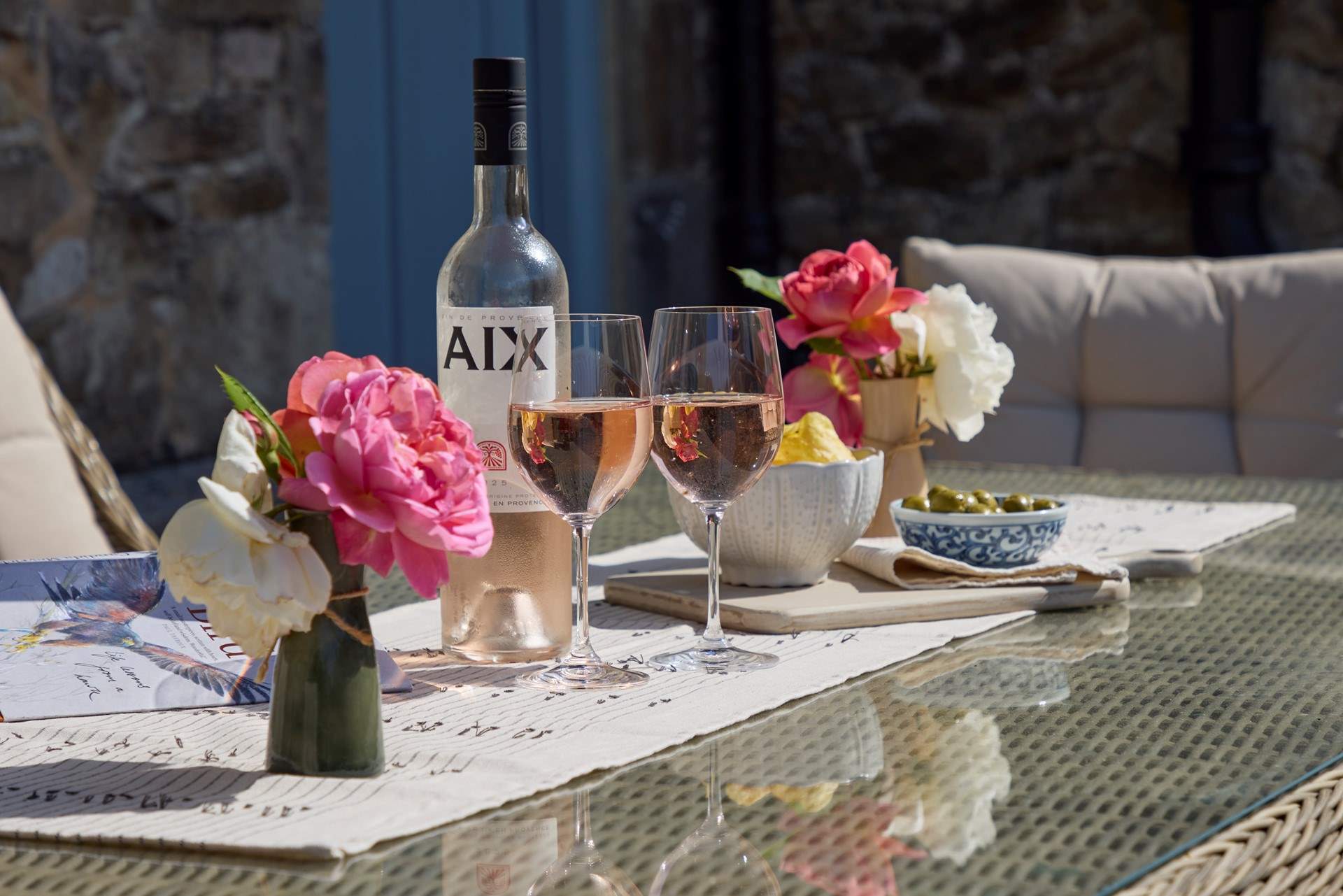 Sit out in the evening sun and enjoy a glass of wine.