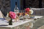 Sit out in the evening sun and enjoy a glass of wine.