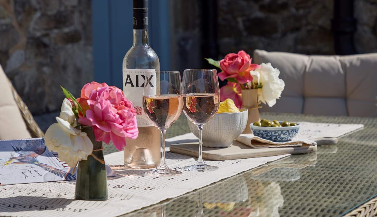 Sit out in the evening sun and enjoy a glass of wine.