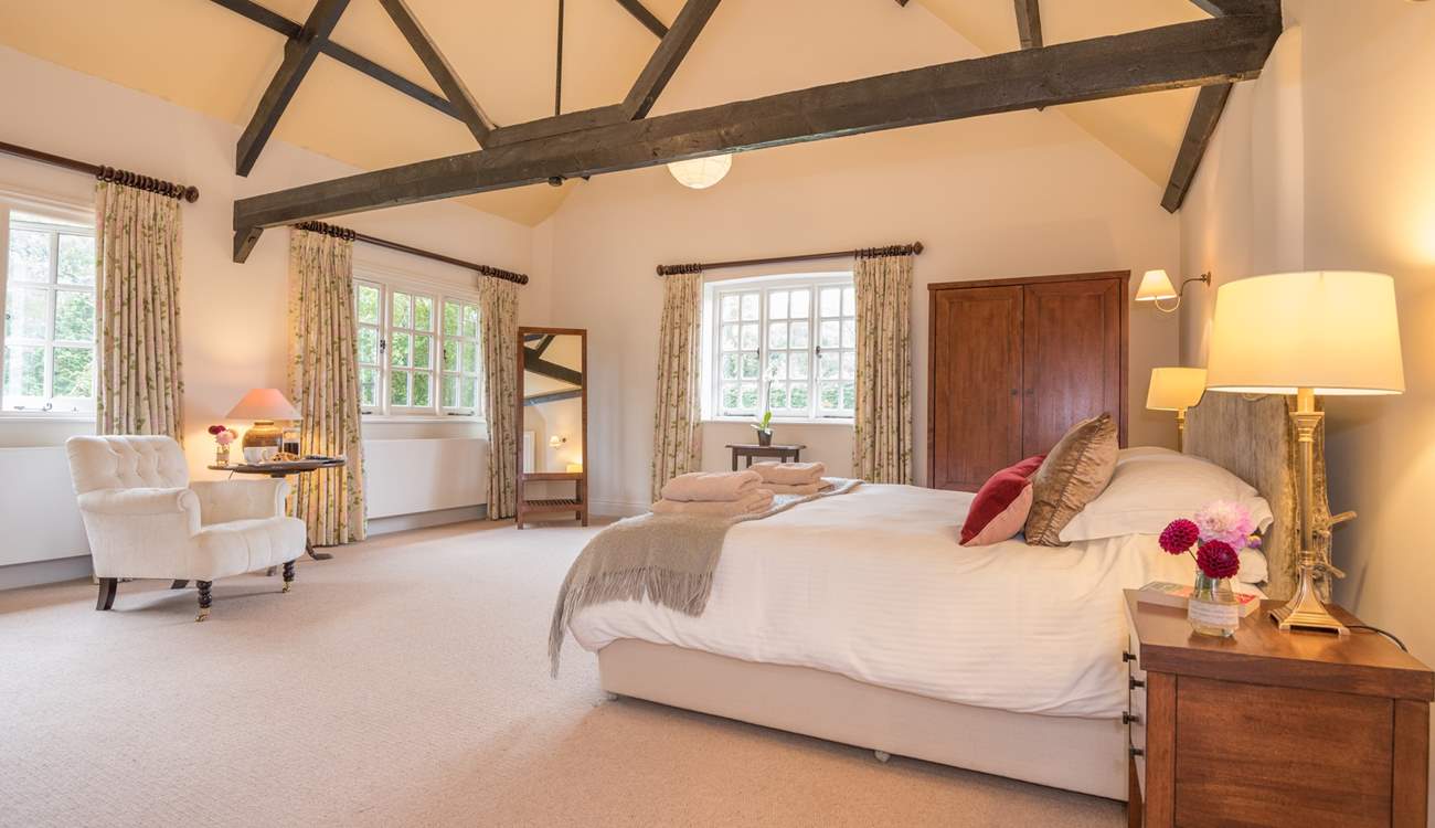 The master bedroom is very spacious and beautifully furnished.