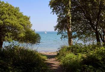 Walk through the woodlands to your very own beach.