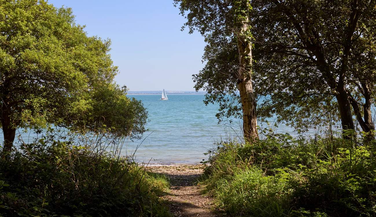 Walk through the woodlands to your very own beach.