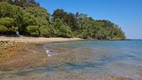 The beach is made up of sand and shingle and is a great spot to watch the boats sail by.