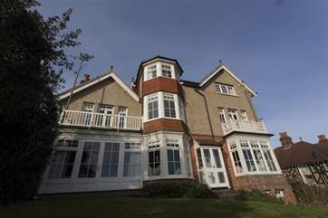 The rear of this large Victorian home.
