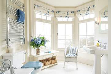 The bathroom on the first floor has sea views.