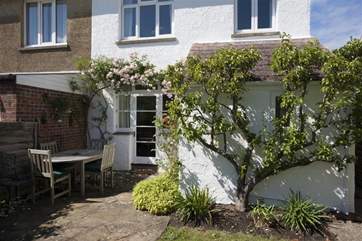 The rear garden is a sun-trap and safe for the children to run around in.