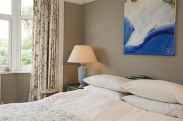 The master bedroom with king-size bed.