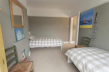 This twin bedroom is a lovely room for the children to stay in.
