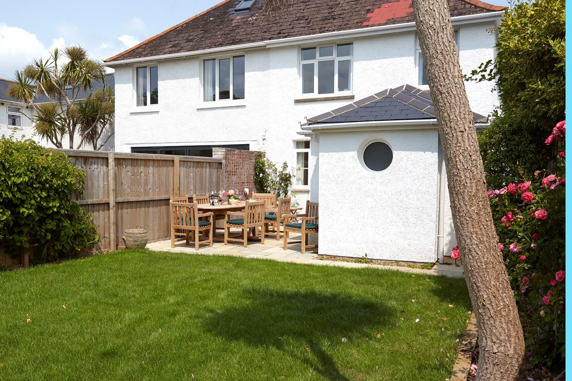 The rear garden is a sun-trap and safe for the children to run around in.