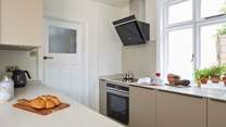 The kitchen has all the modern amenities.