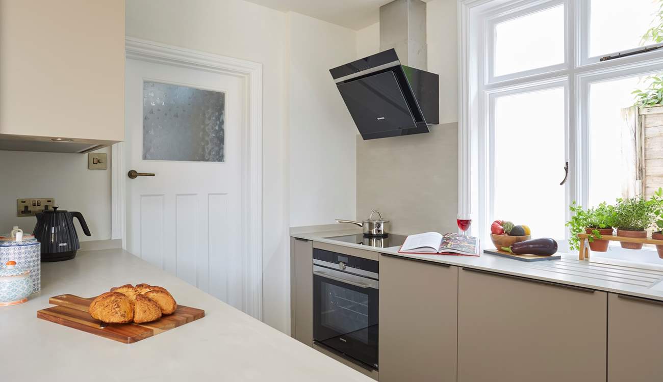 The kitchen has all the modern amenities.