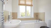 The main bathroom also has a separate shower.