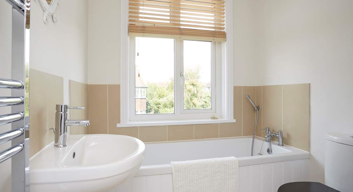 The main bathroom also has a separate shower.