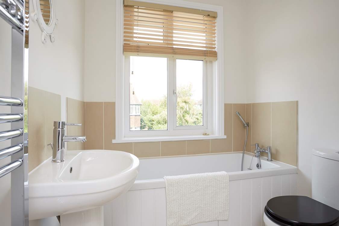The main bathroom also has a separate shower.